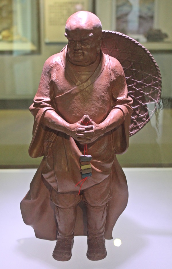 statuette of a monk