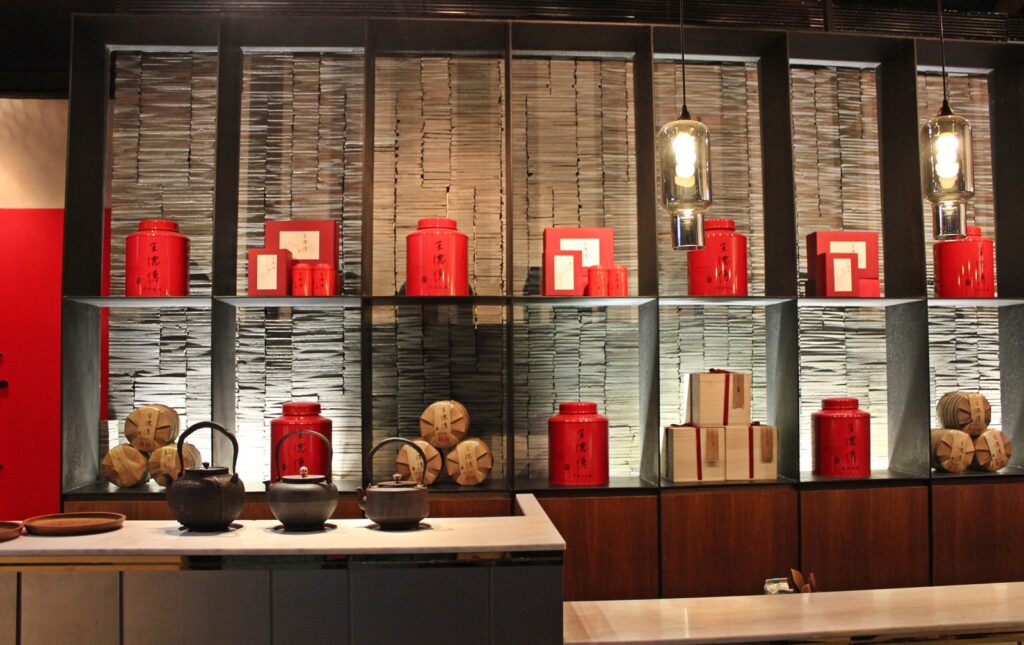 shelves displaying tea cannisters in teahouse