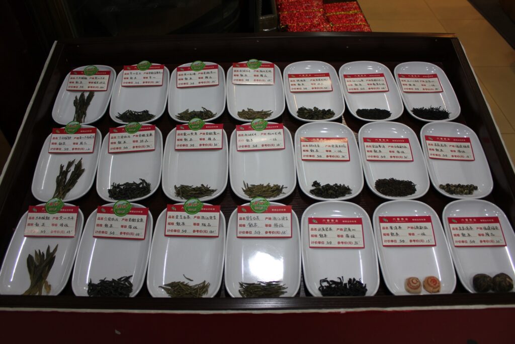 tea samples in white dishes