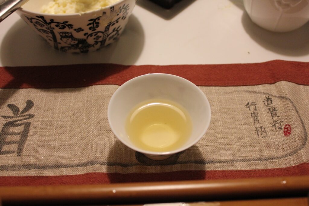 tea liquor in white tea cup