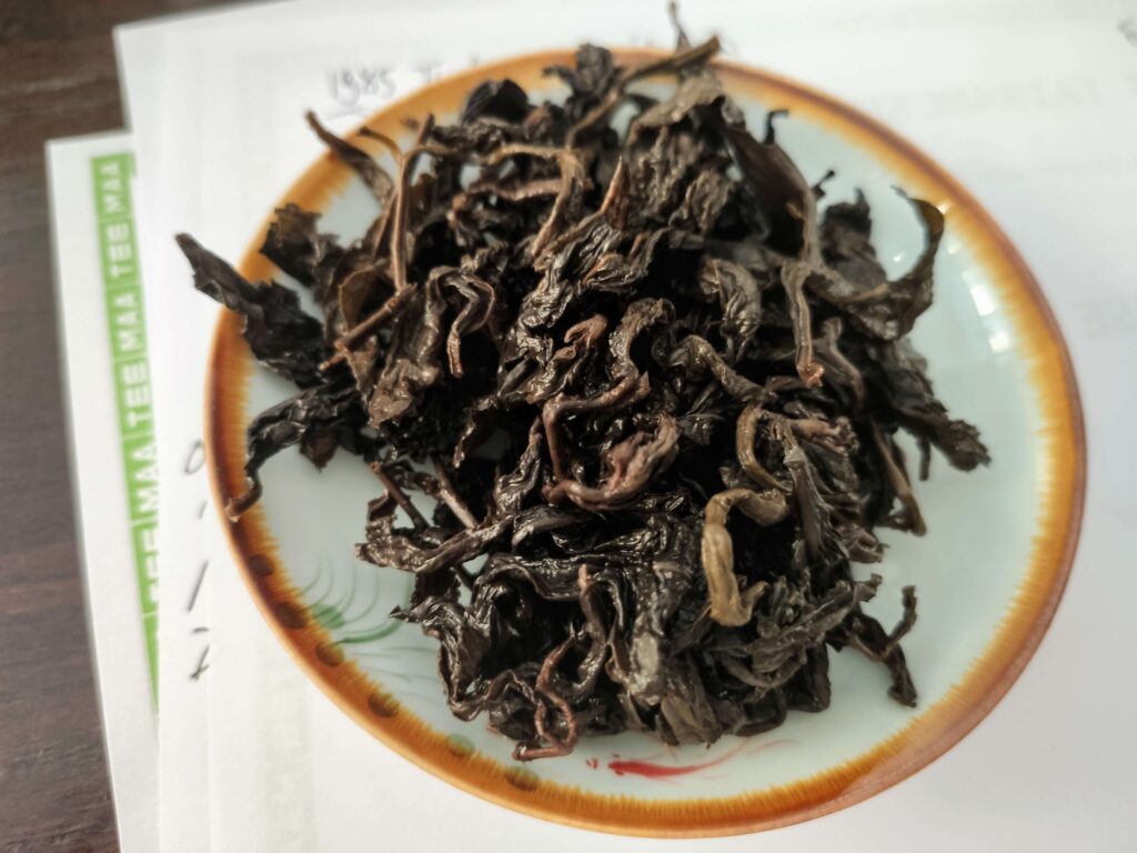 wet tea leaves in gaiwan