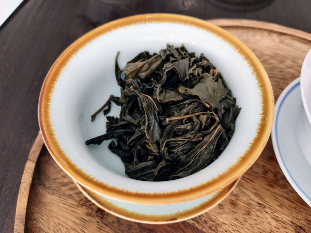 Baozhong Oolong Wet wet tea leaves in gaiwan