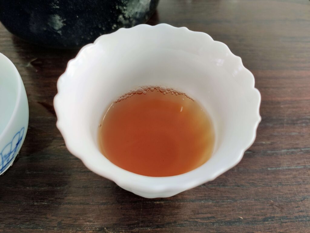 tea liquor in white tea cup