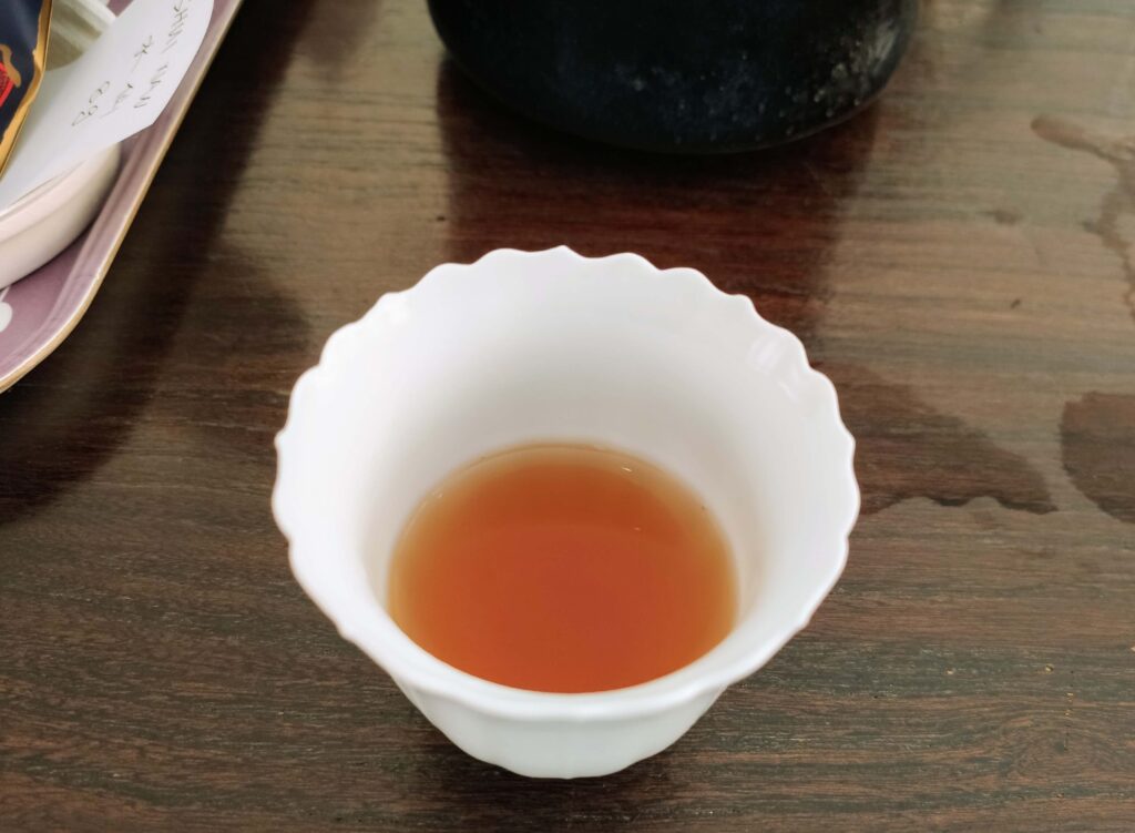 tea liquor in white cup