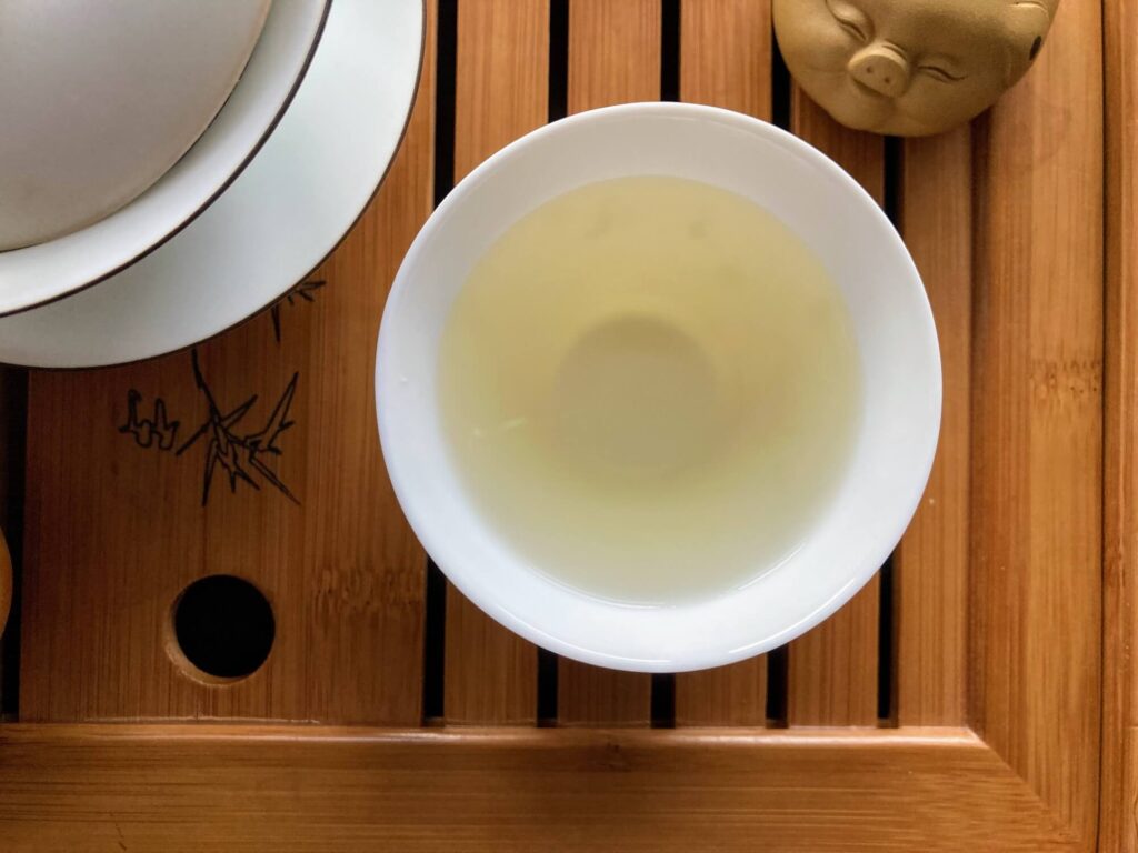 IMG_8310 tea in white tea cup on wooden tea tray
