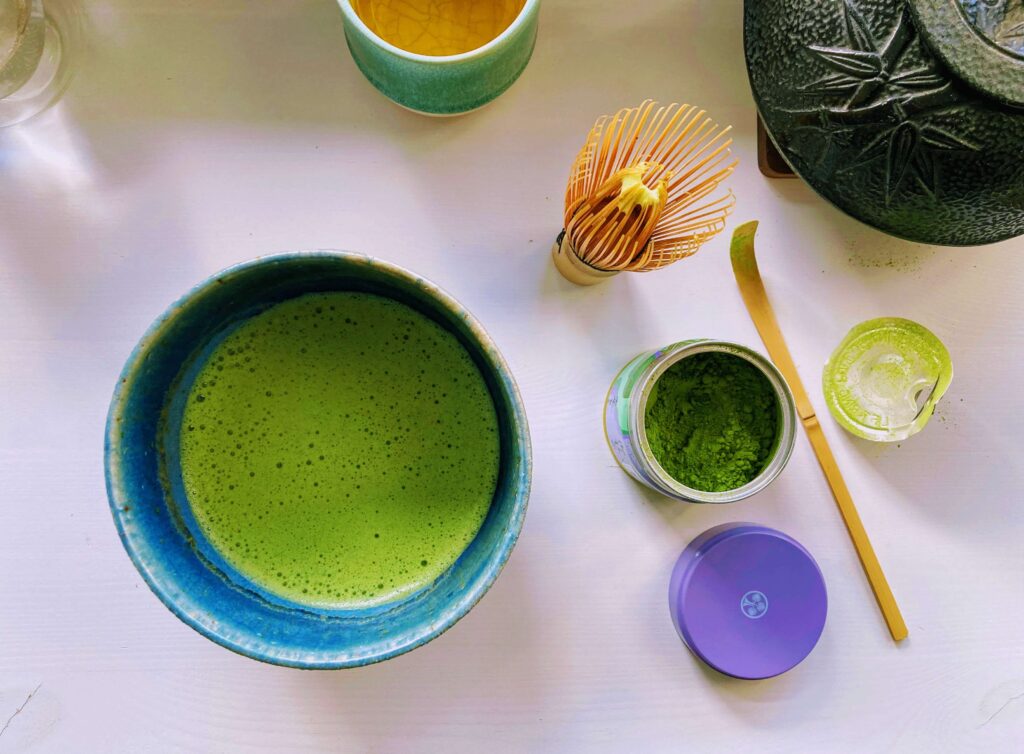 IMG_8379_Yaeyama_web matcha in a bowl with whisk and tea tin