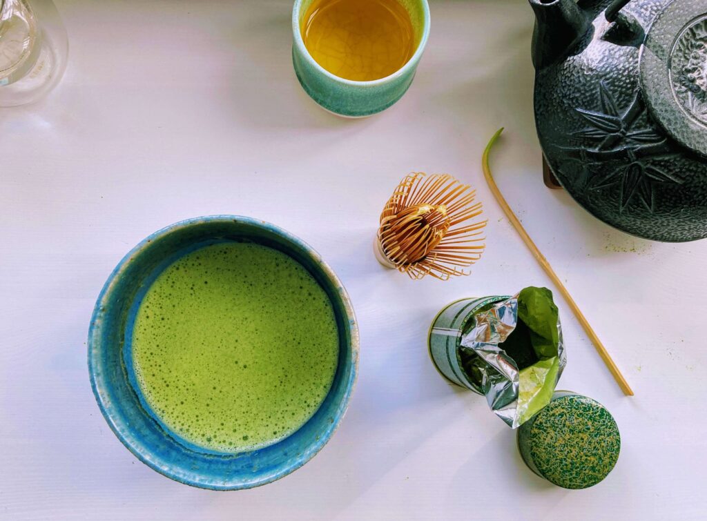 IMG_8399_Chiyo_Mukashi_web matcha in a bowl with whisk and tea tin